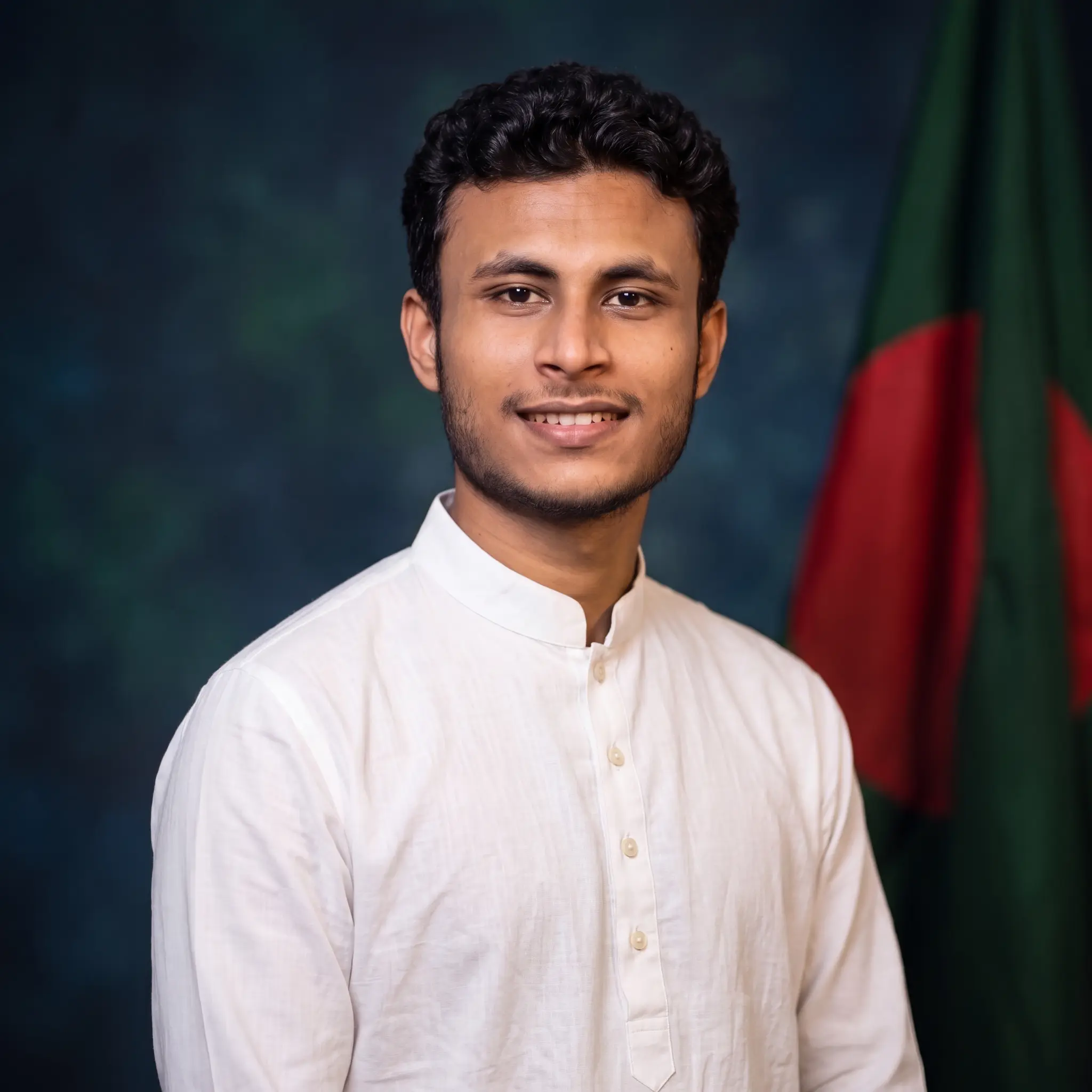 M A Halim Rahi in a white kurta